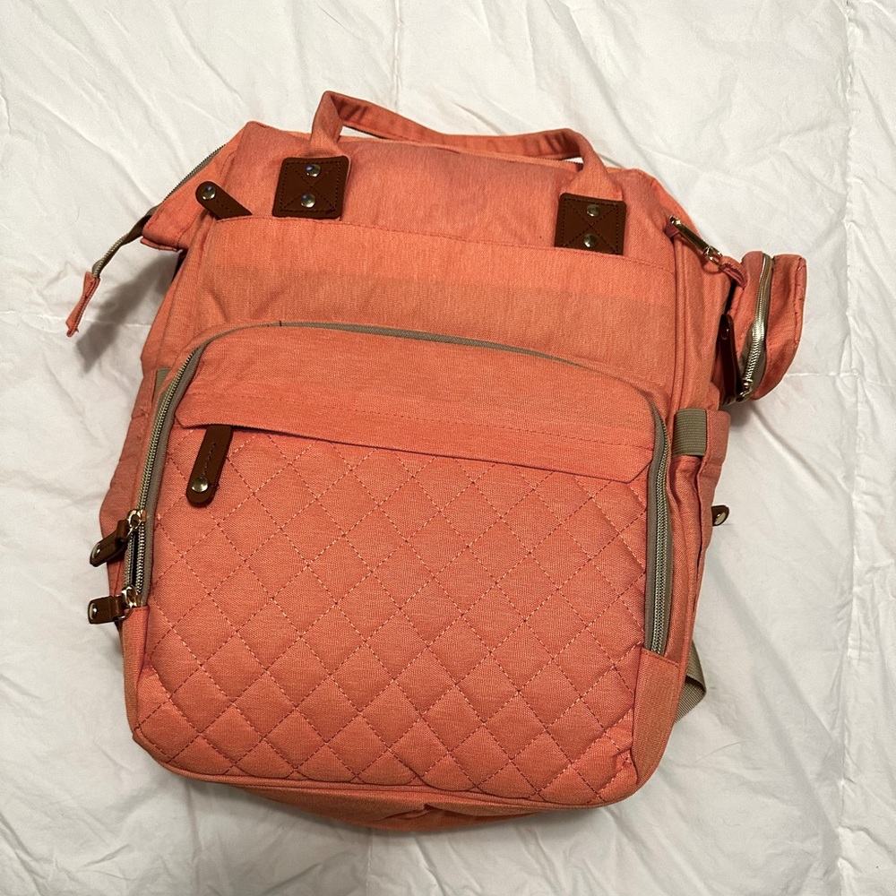 Diaper bag never used with changing station attached.